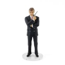 A Corgi 'icon' figure of Sir Roger Moore as James Bond, and an Eaglemoss die-cast scale model of...