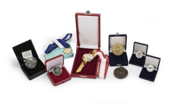 A collection of medals and medallions presented to Sir Roger Moore (9)