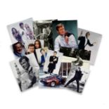 A large collection of photographs and stills of Sir Roger Moore including as James Bond