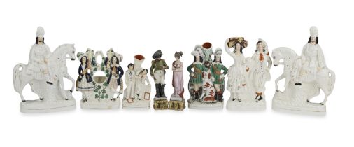 A collection of 19th and 20th century Staffordshire figurines and groups