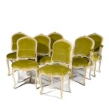 Suite de dix chaises et quatre de fauteuils en bois peint blanc et dor&#233;. Style Louis XV