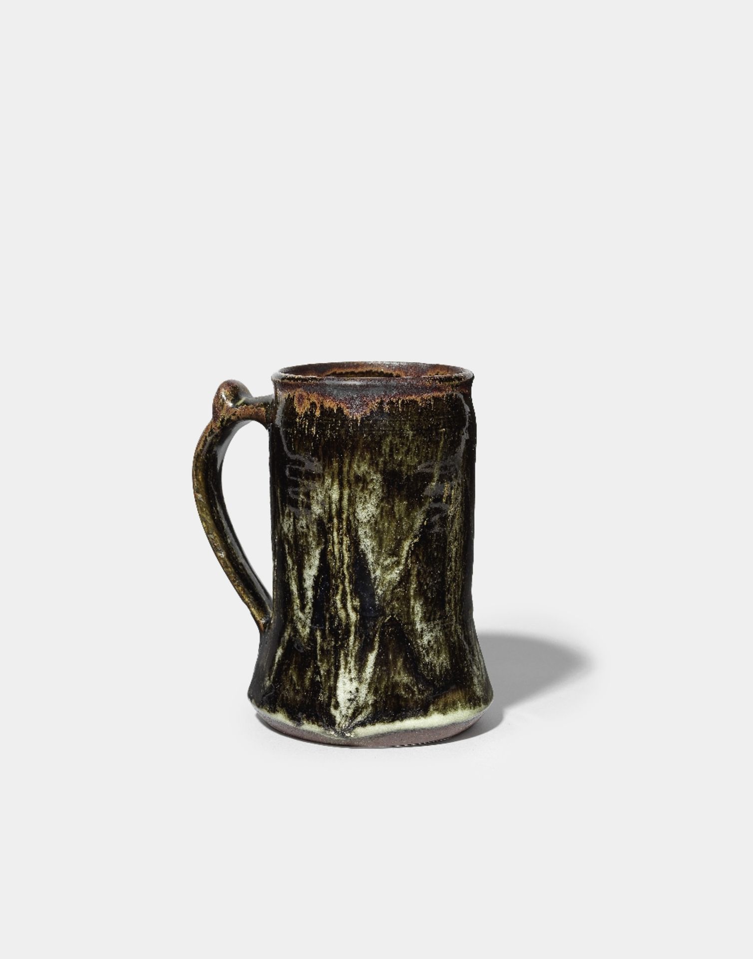 Ladi Kwali (Nigerian, circa 1925-1984) Tankard 14.5 x 13 x 10cm (5 11/16 x 5 1/8 x 3 15/16in).