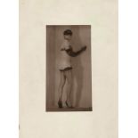 Pierre Molinier (1900-1976) Autoportrait debout avec masque, bas et gants.