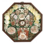 A Shell-Work 'Vase of Flowers' Sailor's Valentine, Late 19th/Early 20th century, 14in x 13 1/2in...