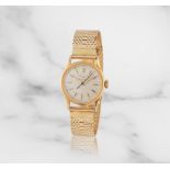 Patek Philippe. An 18K gold manual wind bracelet watch retailed by Tiffany & Co. Patek Philippe....