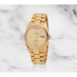 Rolex. An 18K gold automatic diamond set calendar bracelet watch Rolex. Montre bracelet en or ja...
