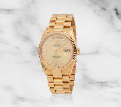 Rolex. An 18K gold automatic diamond set calendar bracelet watch Rolex. Montre bracelet en or ja...