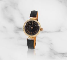 Retailed by Tiffany & Co. An 18K gold manual wind single button chronograph wristwatch Distribu&...