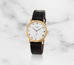 Patek Philippe. An 18K gold manual wind wristwatch Patek Philippe. Montre bracelet en or jaune 1...