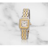 Cartier. A lady's stainless steel and 18K gold quartz calendar bracelet watch Cartier. Montre br...
