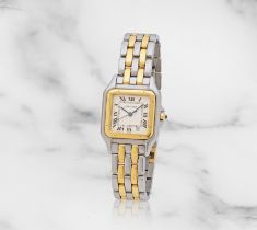 Cartier. A lady's stainless steel and 18K gold quartz calendar bracelet watch Cartier. Montre br...