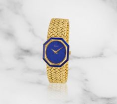 Piaget. A lady's 18K gold and lapis lazuli manual wind wristwatch Piaget. Montre bracelet de dam...
