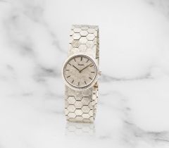 Piaget. A lady's 18K white gold manual wind bracelet watch Piaget. Montre bracelet de dame en or...