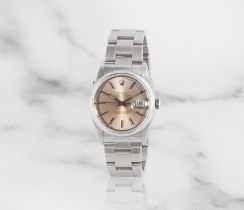 Rolex. A stainless steel automatic calendar bracelet watch Rolex. Montre bracelet en acier avec ...