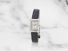 Jaeger-LeCoultre. A stainless steel manual wind reversible rectangular double dial wristwatch wi...