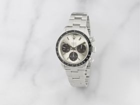 Rolex. A fine stainless steel chronograph bracelet watch Rolex. Beau chronographe bracelet en ac...