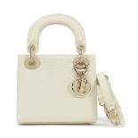 Christian Dior: a Matte Latte Lizard Mini Lady Dior 2022 (includes shoulder strap, dust bag and ...