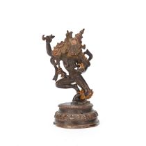 A BRONZE FIGURE OF VAJRADAKINI Tibet, 14th Century