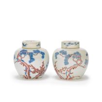 A PAIR OF UNDERGLAZE BLUE AND COPPER-RED 'THREE FRIENDS OF WINTER' JARS AND COVERS 19th century (4)