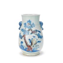 A COPPER-RED BLUE AND WHITE VASE, HU 19th century