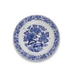 A BLUE AND WHITE 'FLORAL' DISH Kangxi six-character mark and of the period (2)