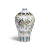 AN EXCEPTIONALLY RARE IMPERIAL FAMILLE ROSE AND UNDERGLAZE-BLUE DECORATED 'POMEGRANATE' VASE, ME...