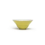 A SMALL YELLOW ENAMELLED OGEE-SHAPED AND FOLIATE-RIMMBED BOWL Guangxu iron-red mark and of the ...