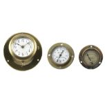 Three brass-cased dashboard instruments, ((3))