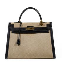 HERMES Paris, circa 1950. Sac 'Kelly Sellier' 36 cm en toile et cuir