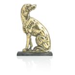 A late 19th early 20th century brass and cast iron dog door-stop