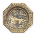 A late 19th century octagonal gilt bronze plate decorated with Pointers