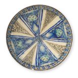 A Sultanabad underglaze-painted pottery bowl Persia, 13th/ 14th Century