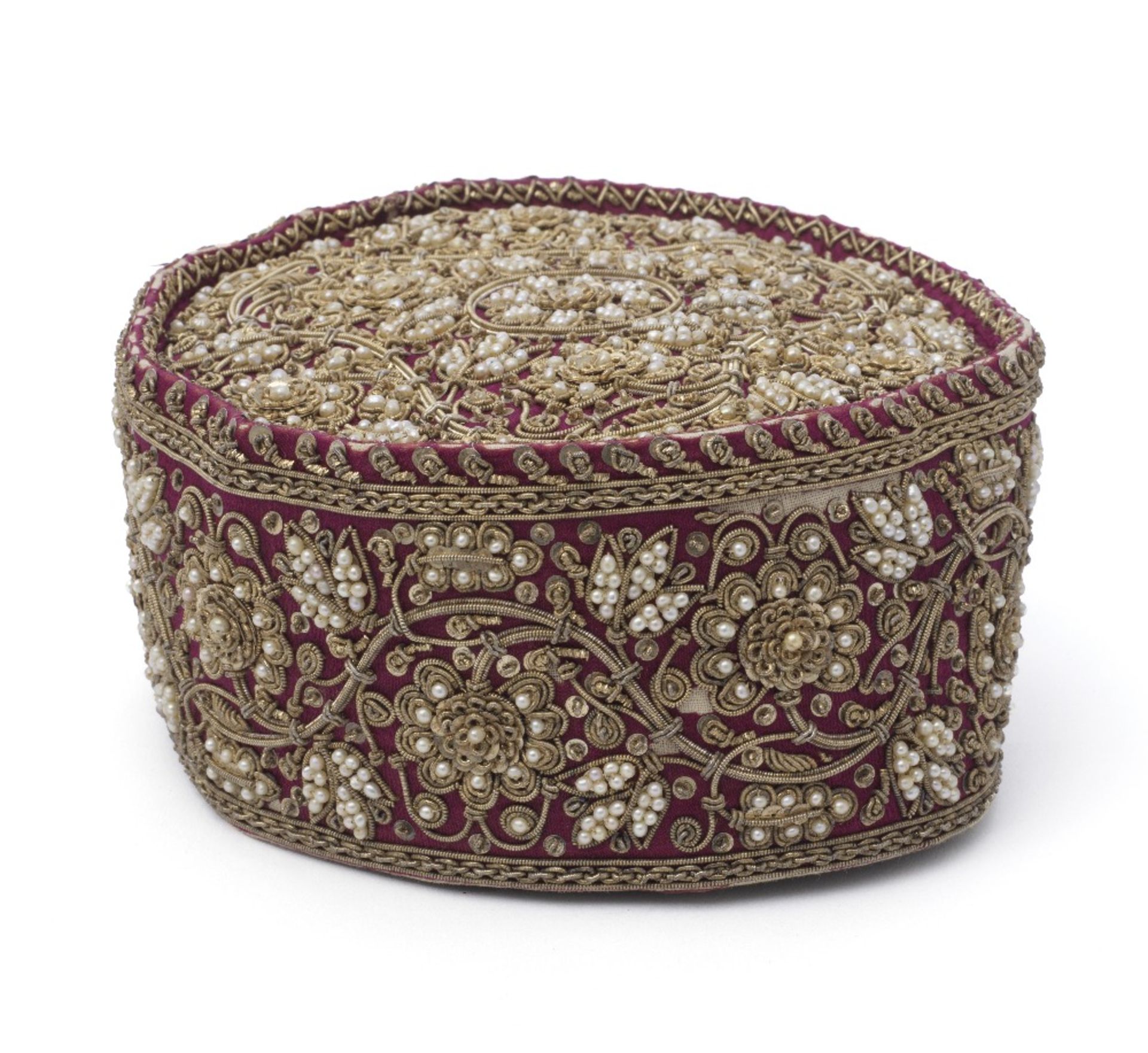 An Indian metal thread and pearl-embroidered prayer cap (topi) North India, 19th Century