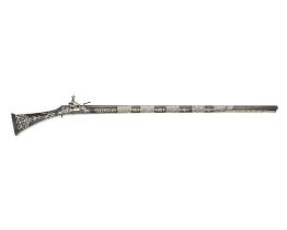 A silver-mounted miquelet rifle Algeria, dated AH 1263/ AD 1846