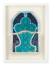 A Timurid moulded pottery mihrab tile fragment Central Asia, second half of the 14th Century