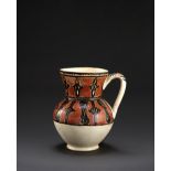 A large Nishapur slip-painted pottery jug Persia, 10th Century