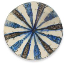 A Kashan underglaze-painted pottery bowl Persia, 12th-13th Century