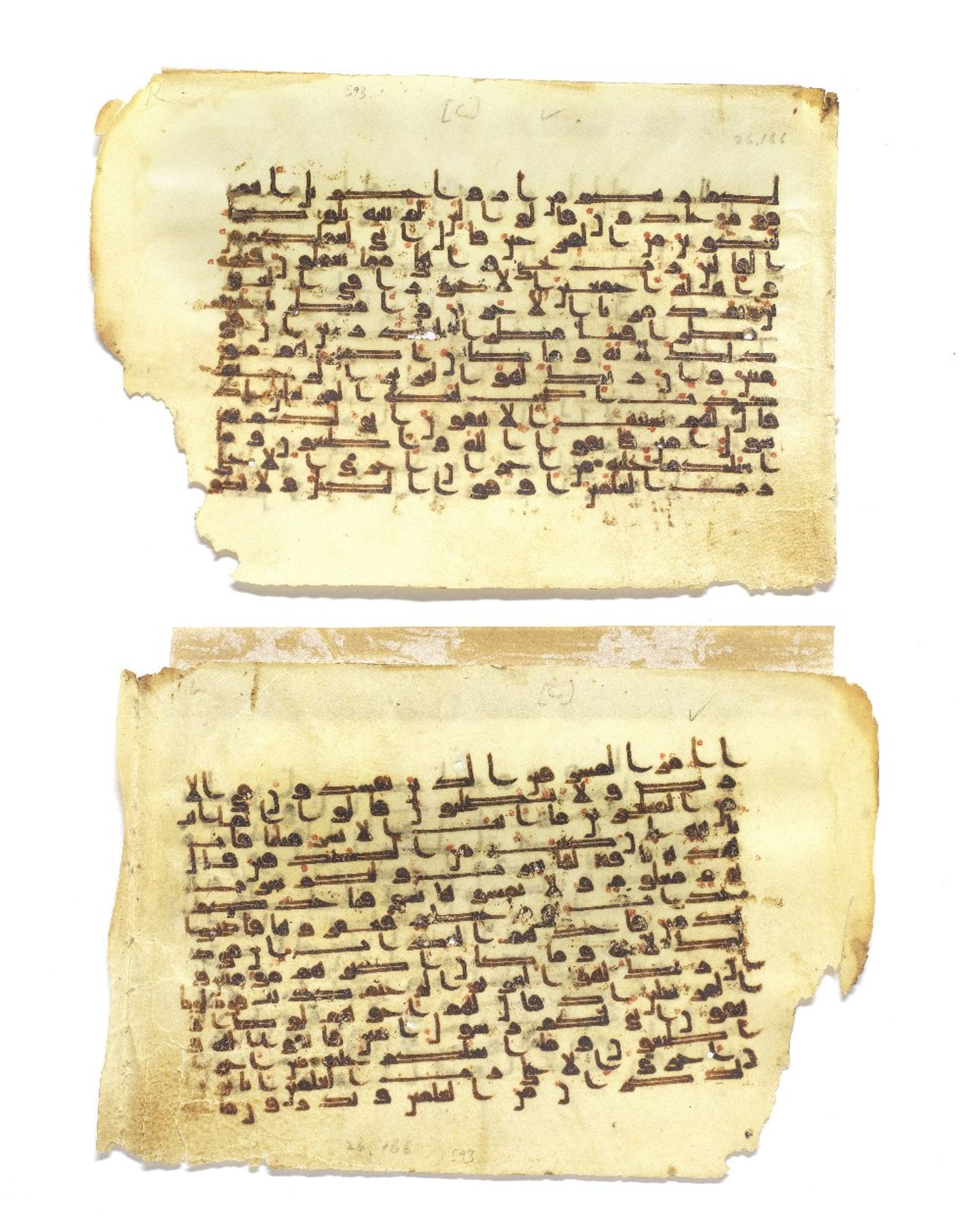 Two consecutive leaves from a manuscript of the Qur'an written in kufic script on vellum Near Ea...