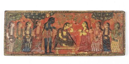 A painted wood book cover with a scene perhaps from the Gita Govinda, depicting Krishna and Radh...