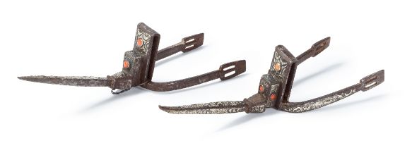 A pair of Ottoman coral and silver-mounted spurs Algeria, 18th/ 19th Century(2)