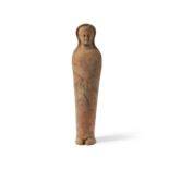 Figurine votive masculine &#233;trusque en terre cuiteAn Etruscan terracotta male votive figure