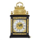 A good late 17th century Dutch gilt metal mounted ebony double basket top table clock with pull ...