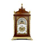An important and very rare late 18th century Dutch brass-mounted mahogany musical table clock wi...
