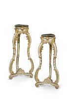 A pair of Louis XV painted and parcel-gilt candle standsMid-18th century (2)