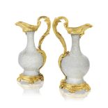 A pair of Louis XV ormolu mounted Chinese crackle glazed ewers The porcelain 18th century, the m...