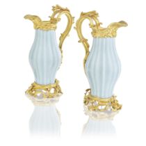 An important pair of Louis XV ormolu mounted Chinese 'Clair de Lune' celadon glazed porcelain ga...