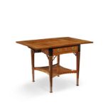 A Dutch satinwood, tulipwood, ebony and marquetry Pembroke or supper tableIn the manner of Thoma...
