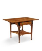 A Dutch satinwood, tulipwood, ebony and marquetry Pembroke or supper tableIn the manner of Thoma...