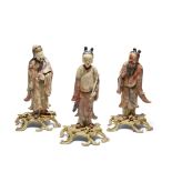 A set of three 18th century Chinese carved soapstone figures of Daoist Immortals Mounted on Loui...