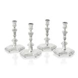 A matched set of four 18th century Dutch cast silver candlesticks Three with maker's mark for Wi...